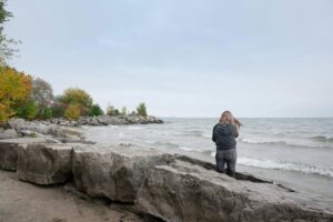 Woman by the water in Port Credit